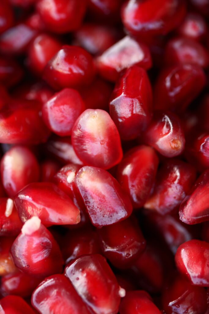 can I feed my dog pomegranate seeds?